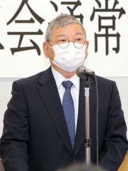 あいさつする石田会長