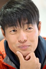 山行を振り返る野村さん（金野和彦撮影）