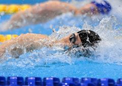 【男子１００メートル自由形・予選８組】４９秒１４のトップタイムで首位で準決勝進出を決めた坂田怜央（ＪＯＹＦＩＴ帯広、帯南町中出）＝金野和彦撮影