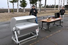置き配荷物の無人受け取り装置開発　上士幌ドローン配送実証実験