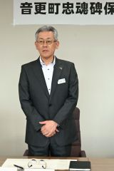 あいさつする町忠魂碑保存会の植田会長