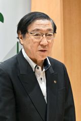 あいさつする川田会頭
