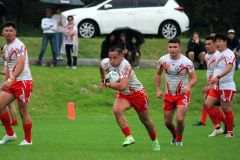 プレーをするラグビーリーグの日本代表の選手たち（２月にシドニーで行われたタイ代表とのテストマッチ、日本ラグビーリーグ協会提供）